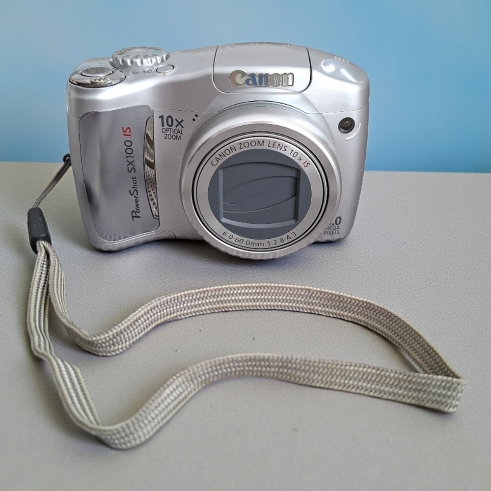 Canon PowerShot SX100 IS Digital Camera Silver Finish Original Box And +